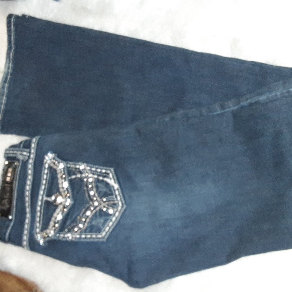 Dark wash flare Jeans (the dog does not come with it😂)